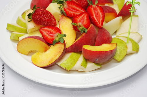 Fruit and berry salad. Strawberries  pears  apples.