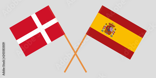Spain and Denmark. The Spanish and Danish flags. Official proportion. Correct colors. Vector