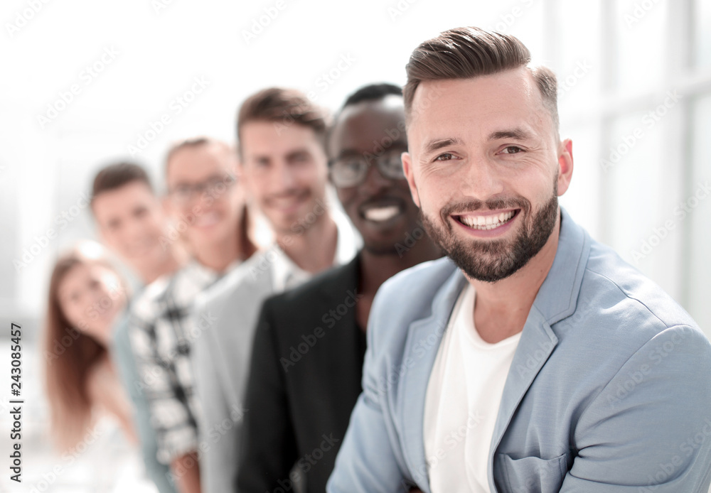 six different people standing in a row. six different people standing in a row.