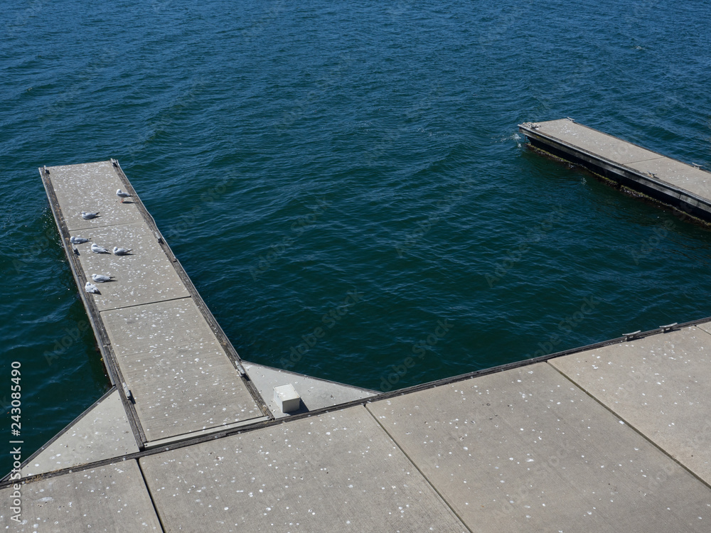 Empty boat dock with waterfront view. Empty boat dock with waterfront view.