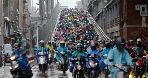 Wallpaper Mural Dihua Street, Taipei city, 26 December 2018:- Crowded of scooter in taipei city at rain day Torontodigital.ca