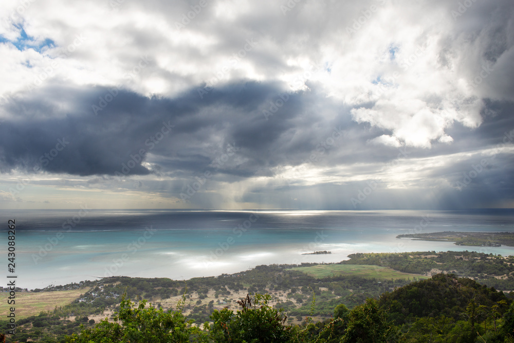 View of the Indian Ocean from the coast of the island of Mauritius in inclement weather. View of the Indian Ocean from the coast of the island of Mauritius in inclement weather.