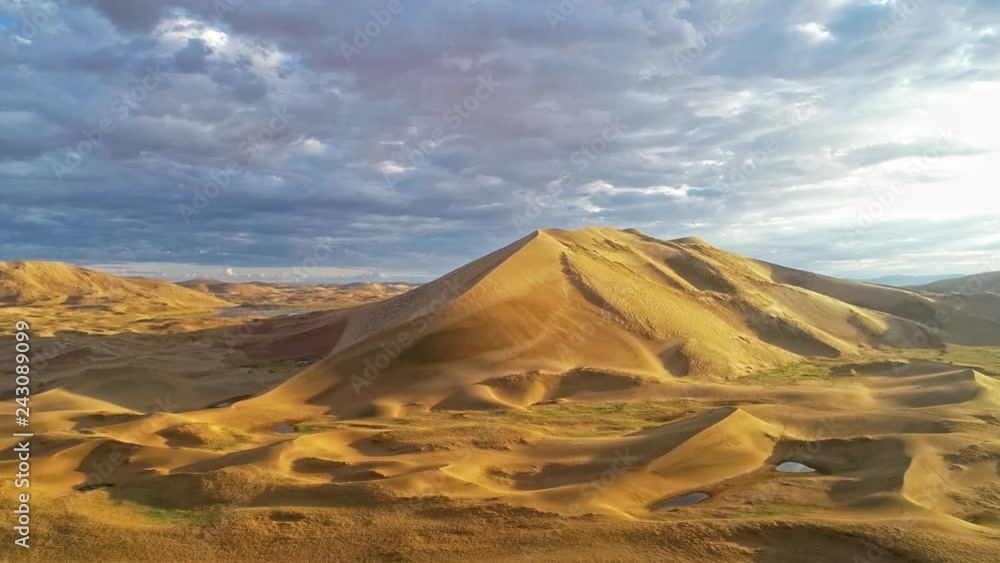 Barkhans in Mongolia sandy dune desert Mongol Els near lake Durgen Nuur. Khovd province, Western Mongolia. Barkhans in Mongolia sandy dune desert Mongol Els near lake Durgen Nuur. Khovd province, Western Mongolia.