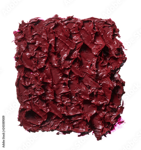 Smear of burgundy red lipstick