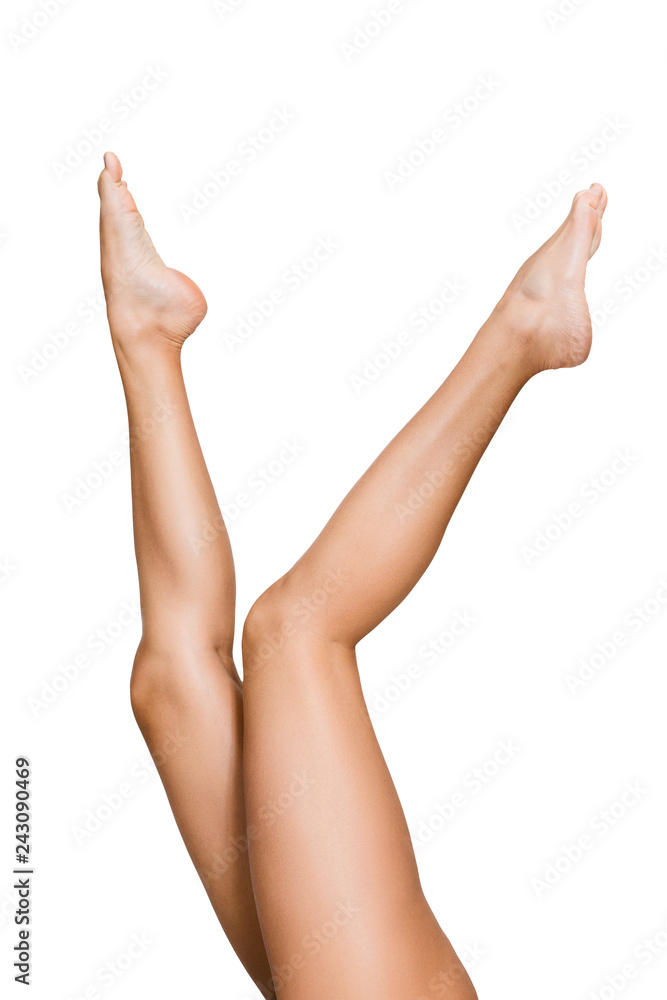 Beautiful woman lifting her legs up in air Beautiful woman lifting her legs up in air