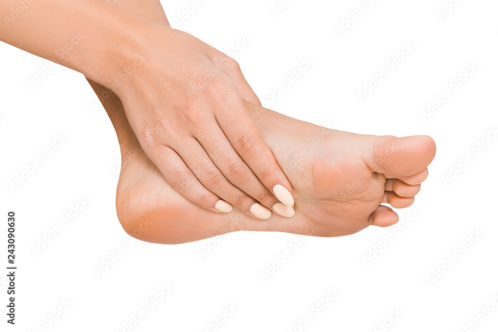 Woman touching her soft after beauty procedures soles Woman touching her soft after beauty procedures soles