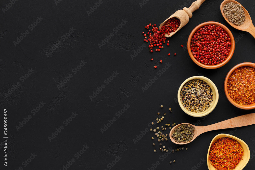 Table with different spices and peppercorns, top view - obrazy, fototapety, plakaty 