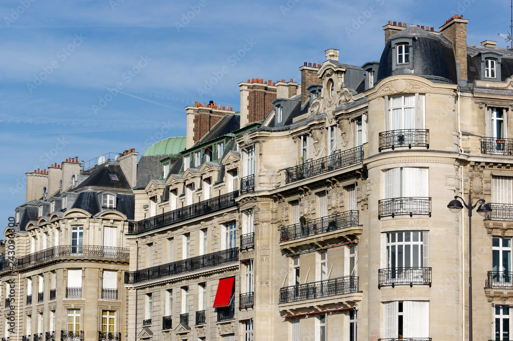 Haussmannian buildings facades in Paris city