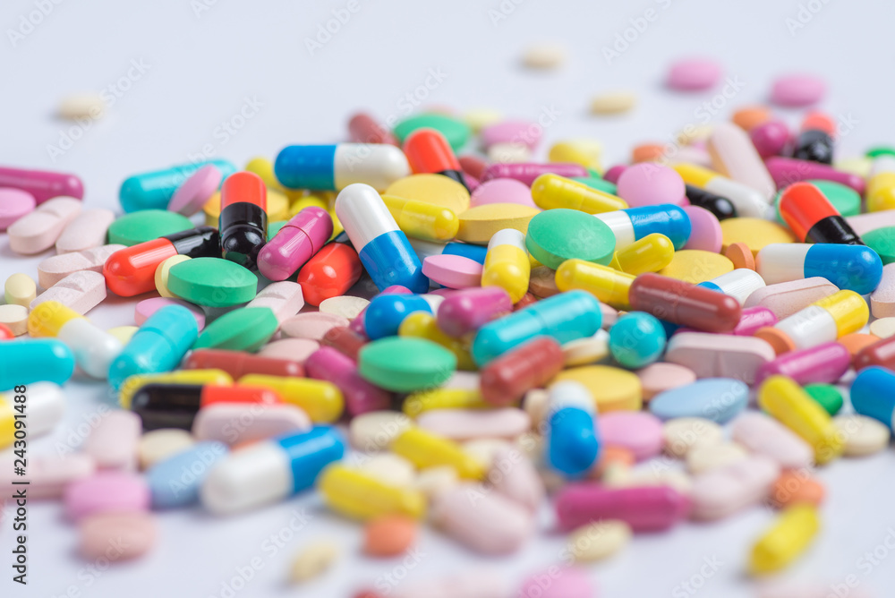 Tablets and pills on a white background Tablets and pills on a white background