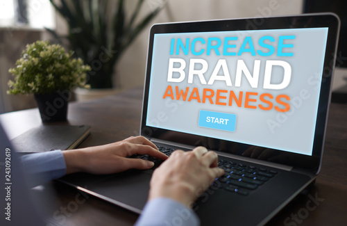 Increase brand awareness text on screen. Advertising and marketing concept.