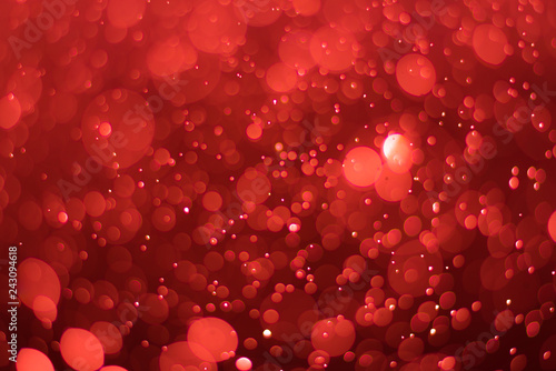 abstractr Ruby red background with blur bokeh light effect
