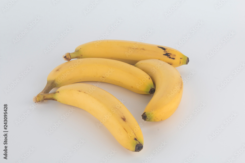 a tasty yellow banana with a white background a tasty yellow banana with a white background