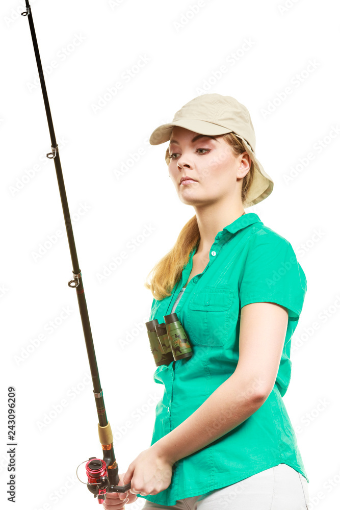 Woman with fishing rod, spinning equipment