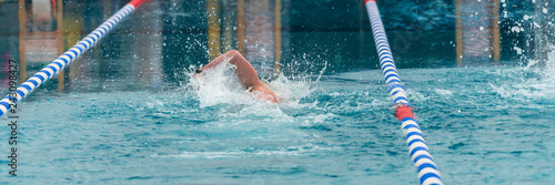 Athlete swimming in a pool 