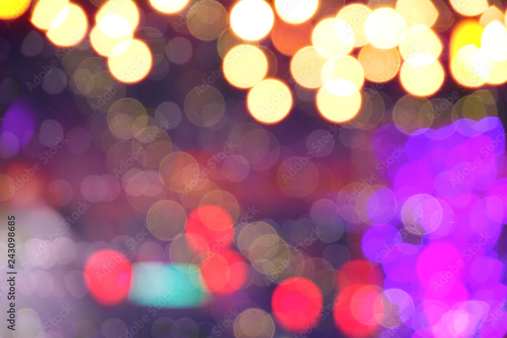 Obraz premium Beautiful colorful circle defocused or bokeh on dark background.