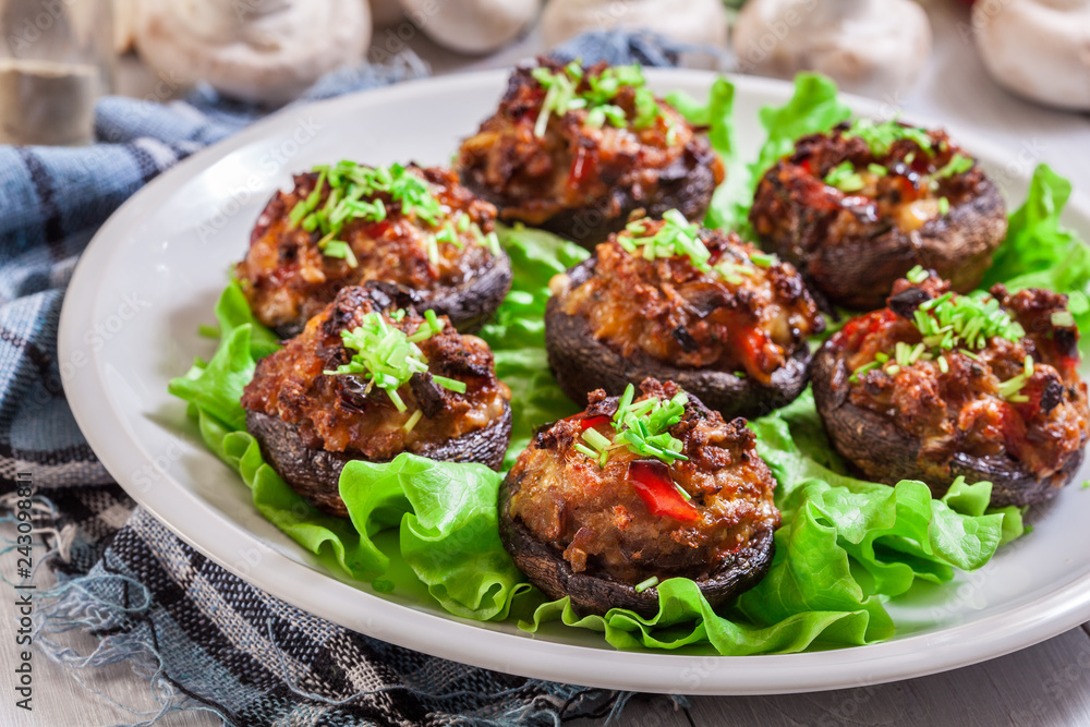 Baked champignon caps stuffed with minced meat Baked champignon caps stuffed with minced meat