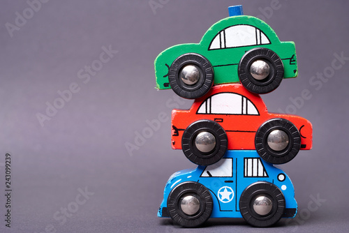 Close Up of used colorful toy cars - car pyramid
