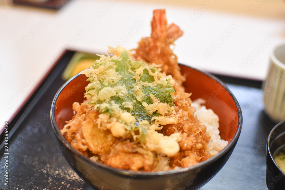 Big two shrimp tempura on rice, traditional tendon dish in Kyoto, Japan. Big two shrimp tempura on rice, traditional tendon dish in Kyoto, Japan.