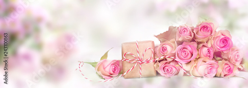 Pink roses with a smal gift