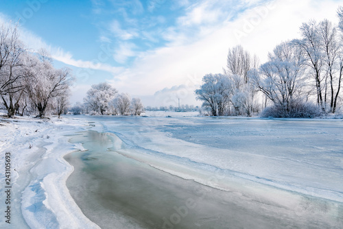 Fototapeta Naklejka Na Ścianę i Meble -  Landscape with frozen water, ice and snow on the Dnieper river in Kiev, Ukraine, during winter