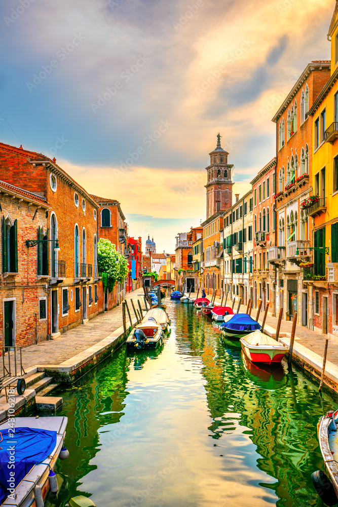 Venice rio San Barnaba cityscape, water canal, church and boats. Italy