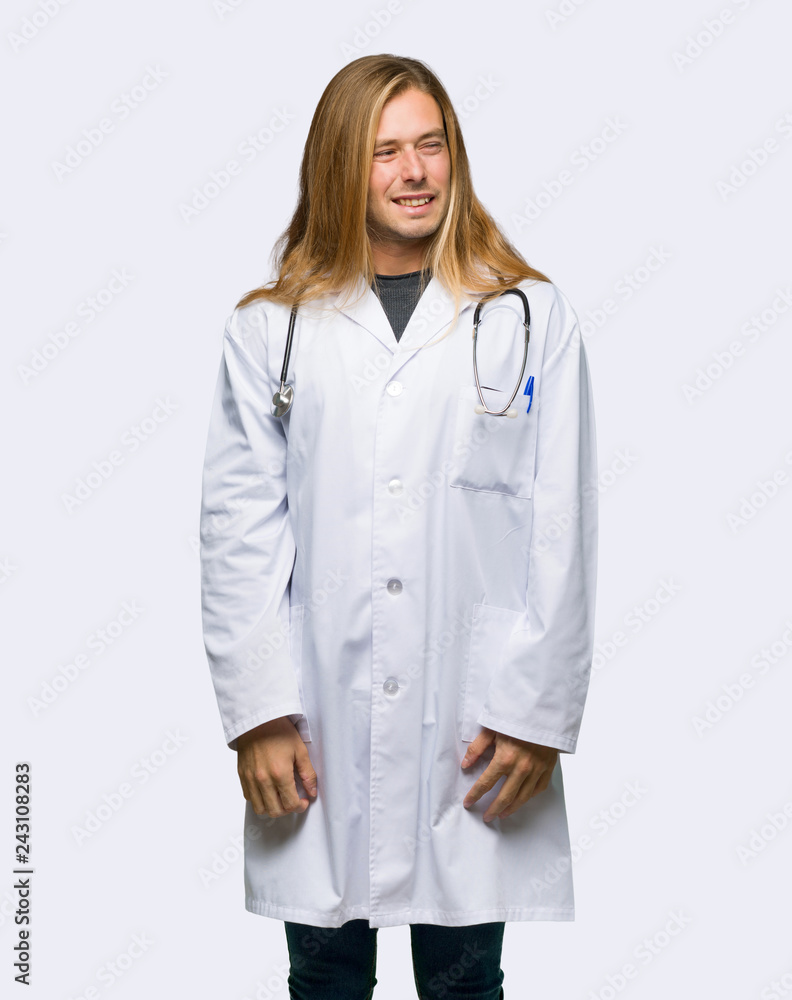 Doctor man is a little bit nervous and scared pressing the teeth on isolated background Doctor man is a little bit nervous and scared pressing the teeth on isolated background