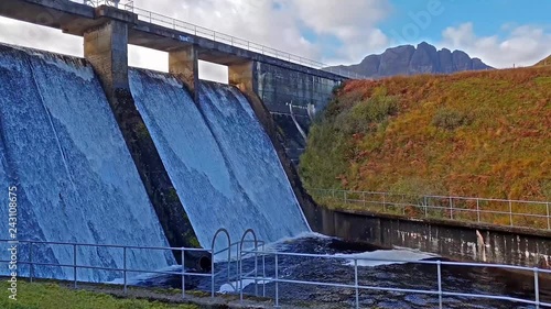 Wallpaper Mural The Storr Lochs hydroelectric power station nestled under the mountains of the Trotternish Peninsula on the Isle of Skye in the West Highlands of Scotland Torontodigital.ca
