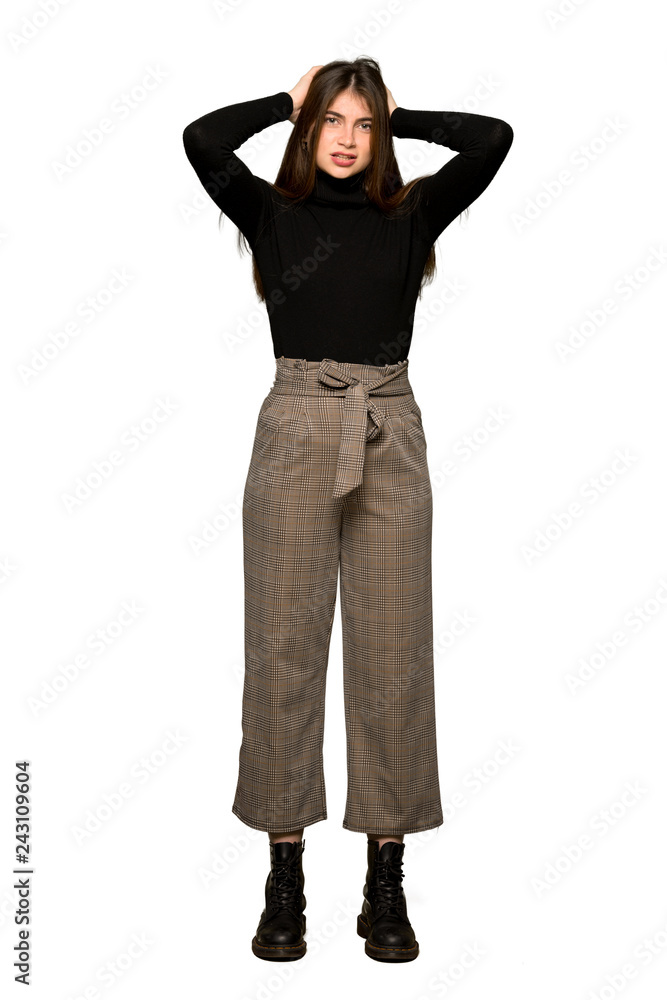 Full-length shot of Pretty girl takes hands on head because has migraine on isolated white background Full-length shot of Pretty girl takes hands on head because has migraine on isolated white background