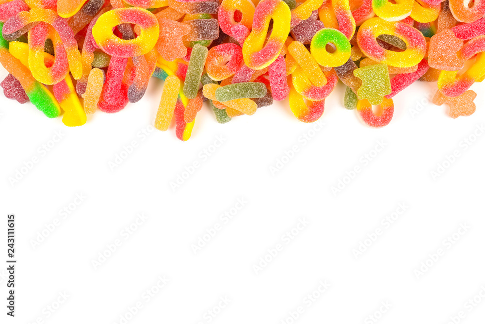 Frame of assorted gummy candies isolated on white. Top view. Space for text or design. Frame of assorted gummy candies isolated on white. Top view. Space for text or design.