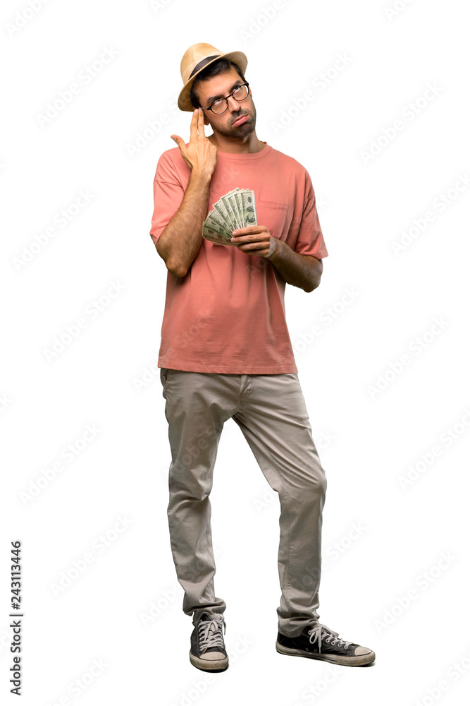 Man holding many bills with problems making suicide gesture on isolated white background Man holding many bills with problems making suicide gesture on isolated white background