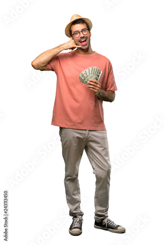 Man holding many bills making phone gesture. Call me back sign on isolated white background