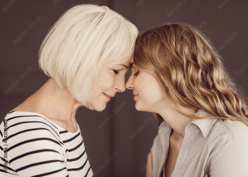 Motherhood concept. Tender mum and beautiful daughter Motherhood concept. Tender mum and beautiful daughter