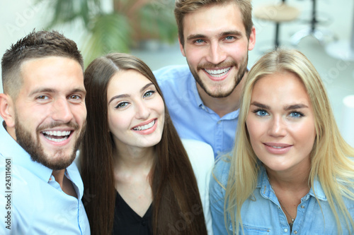 Wallpaper Mural Group shot of colleagues having fun in their office. Torontodigital.ca