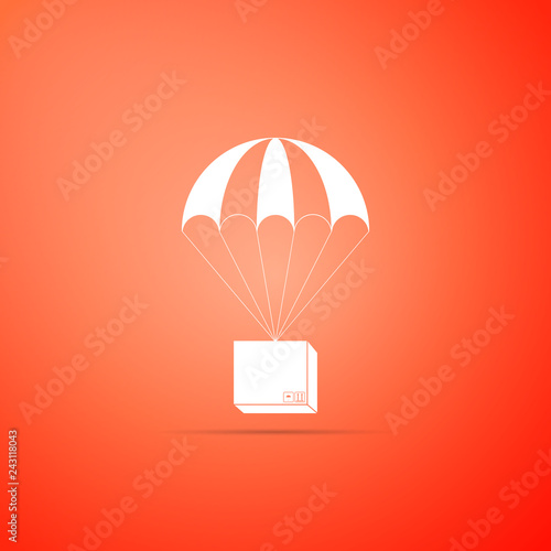 Box flying on parachute icon isolated on orange background. Parcel with parachute for shipping. Delivery service, air shipping concept, bonus concept. Flat design. Vector Illustration