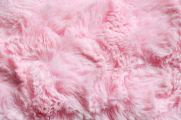 Pink fur background. Surface wool texture. Copy space for your text