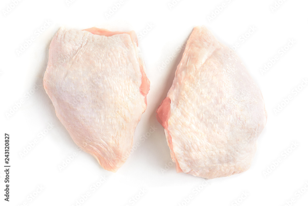 Raw chicken thighs isolated on white background. Raw chicken thighs isolated on white background.
