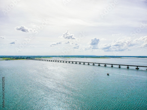 Thep Sada Bridge is a 2-lane reinforced concrete bridge across Lam Pao Dam at Kalasin,Thailand. photo