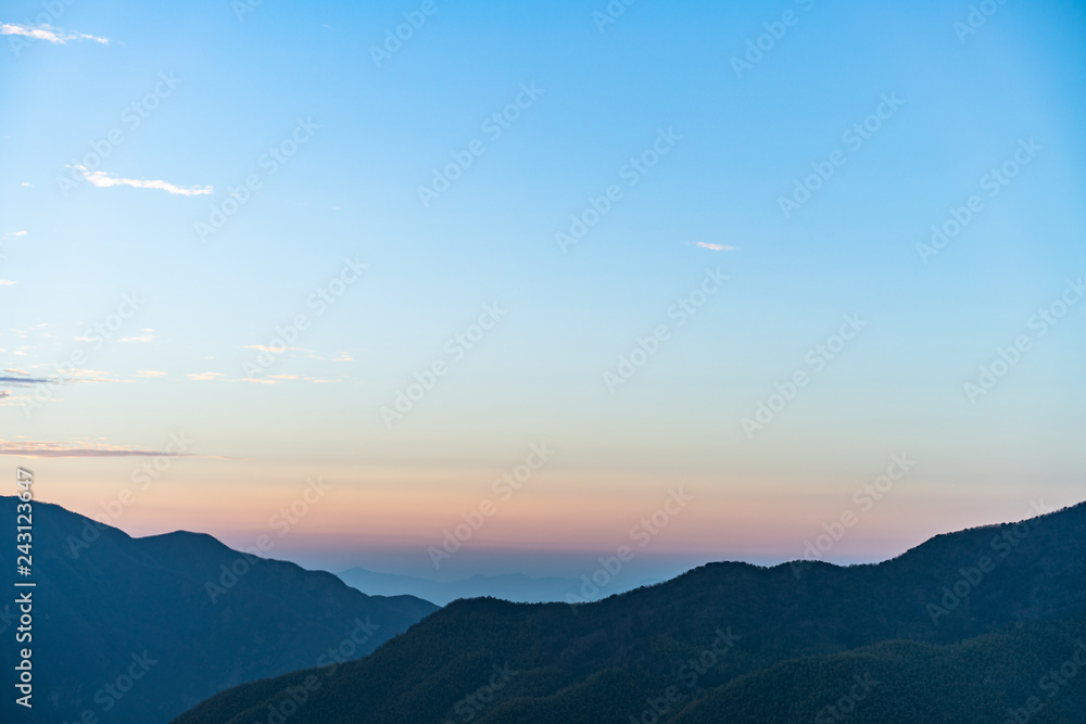 Mountain and sunset background