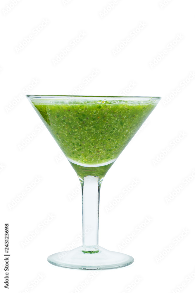 Cocktail glass of homemade spinach and broccoli smoothie smoothie isolated on white background