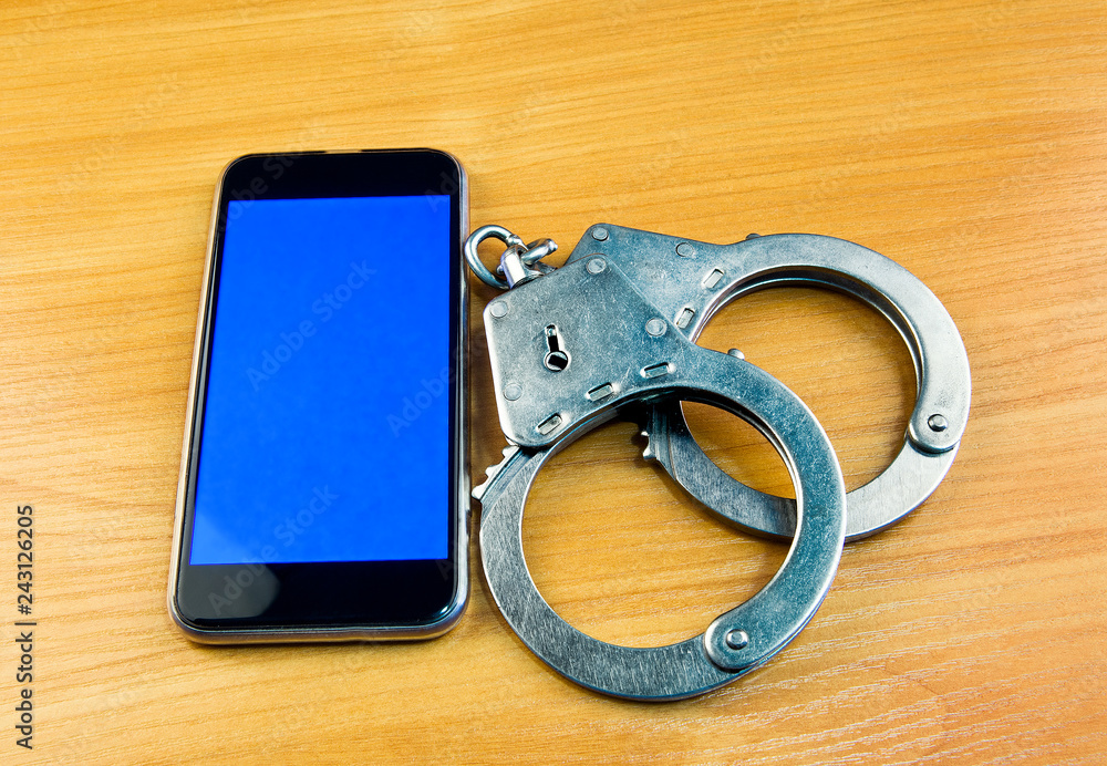 Phone and Handcuffs Phone and Handcuffs