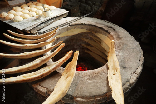 Homemade brad on a national oven tandoor.