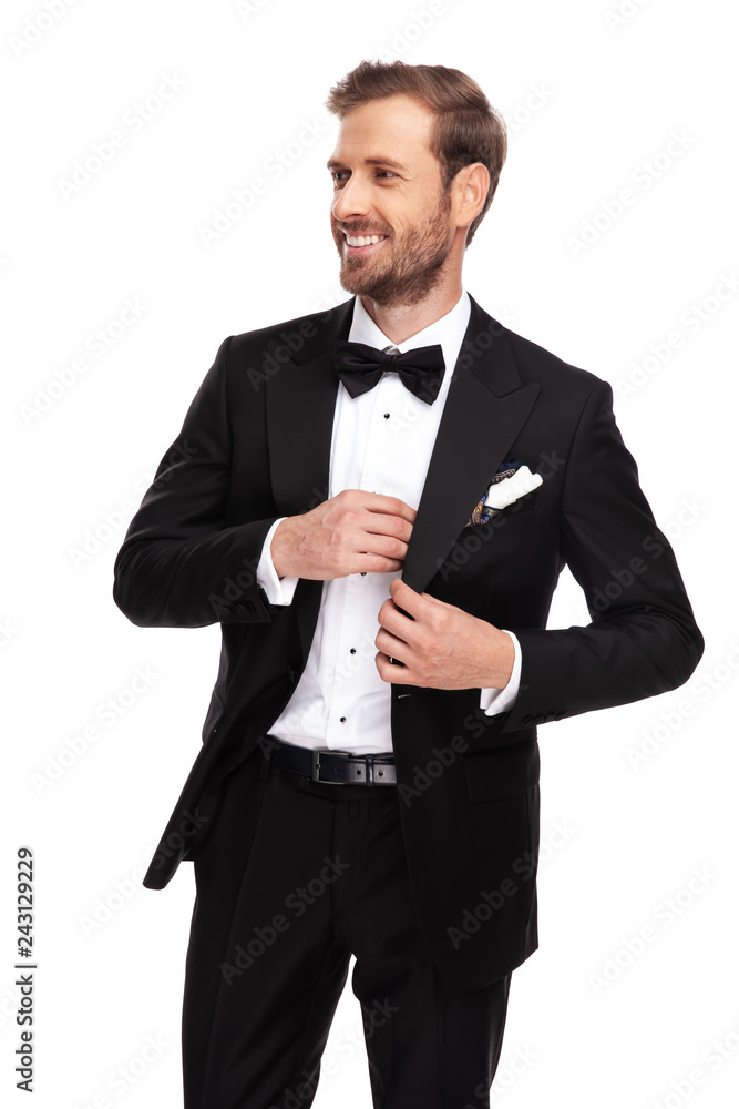 portrait of relaxed businessman looking to side while standing portrait of relaxed businessman looking to side while standing