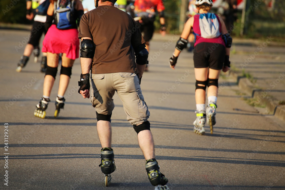 Group of roller blader in the evening sun