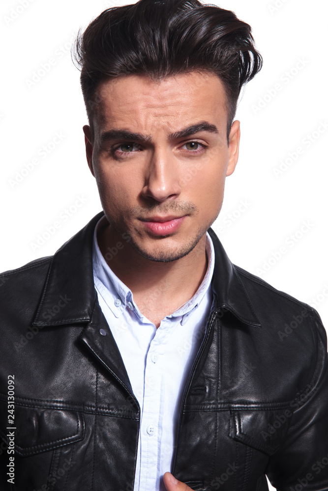portrait of attractive smart casual man in leather jacket portrait of attractive smart casual man in leather jacket