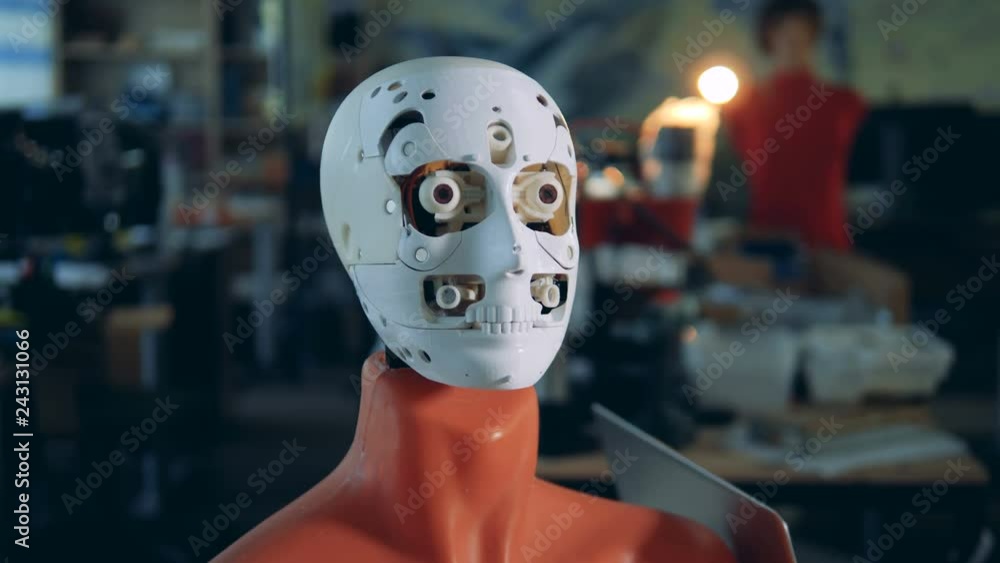 Automated humanoid moving its face, close up. Automated humanoid moving its face, close up.
