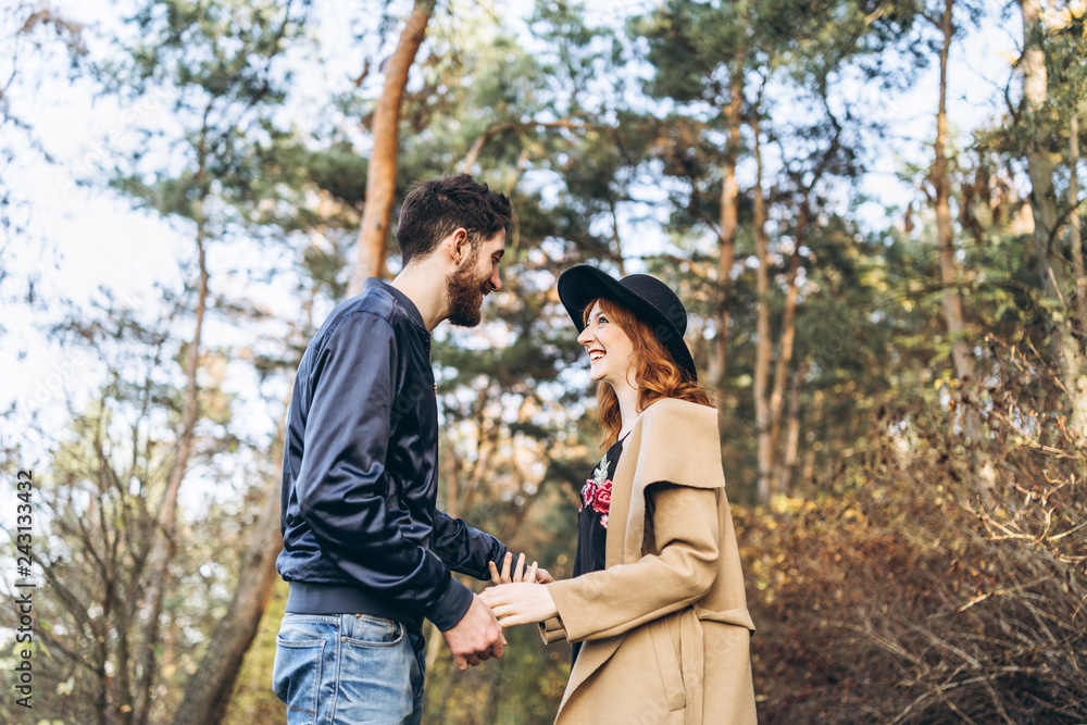 Happy young romantic couple spend time together outdoor. Happy young romantic couple spend time together outdoor.