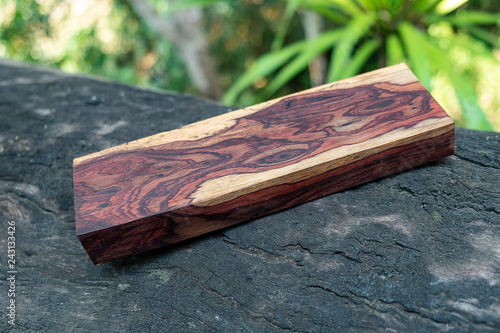 Wood logs of  Burmese rosewood, Exotic cocobolo wood beautiful pattern For Crafts or abstract art background photo