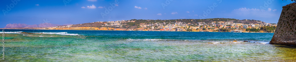 Travel ideas. Colorful Panoramic Image of Chania Skyline Taken From Old Venetian Port Against Blue Sky in Crete, Greece.