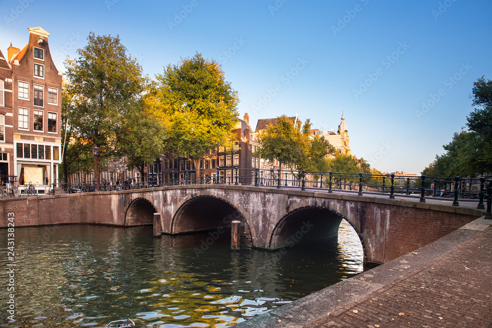 Scene from the city of Amsterdam with bridge and canal