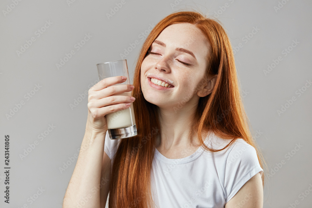 young nice girl enjoys drinking smoothie, close up shot young nice girl enjoys drinking smoothie, close up shot